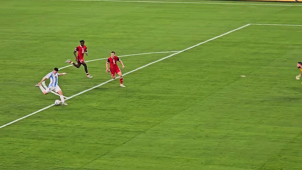 Archive photo: an Argentina player strikes on goal as opponents in red close in (not confirmed to be from this exact match). Source: Wikimedia Commons
