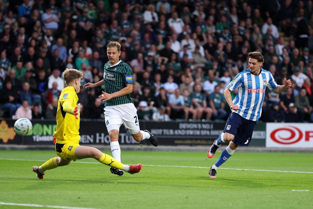 Jack Rudoni doubles Coventry's lead from close range in the fifth minute (25 Aug 2026). Source: The Guardian.